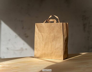 Kraft paper bag on wooden table