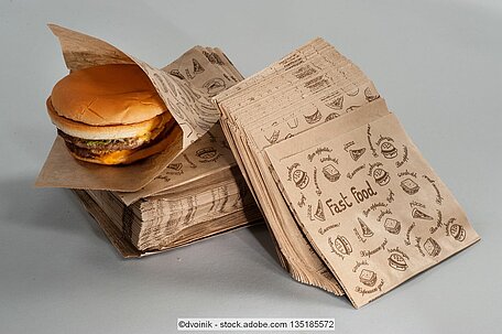 Burger wrapped in packaging paper