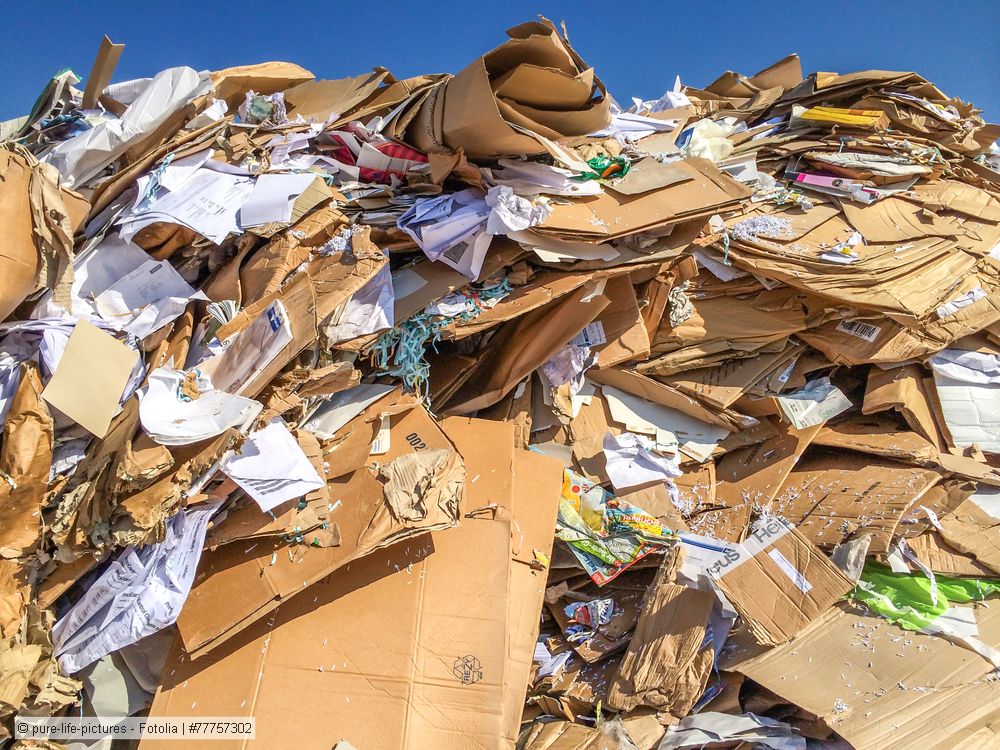 Heap of loose old corrugated containers (OCC) and other recovered paper stored in a yarc.